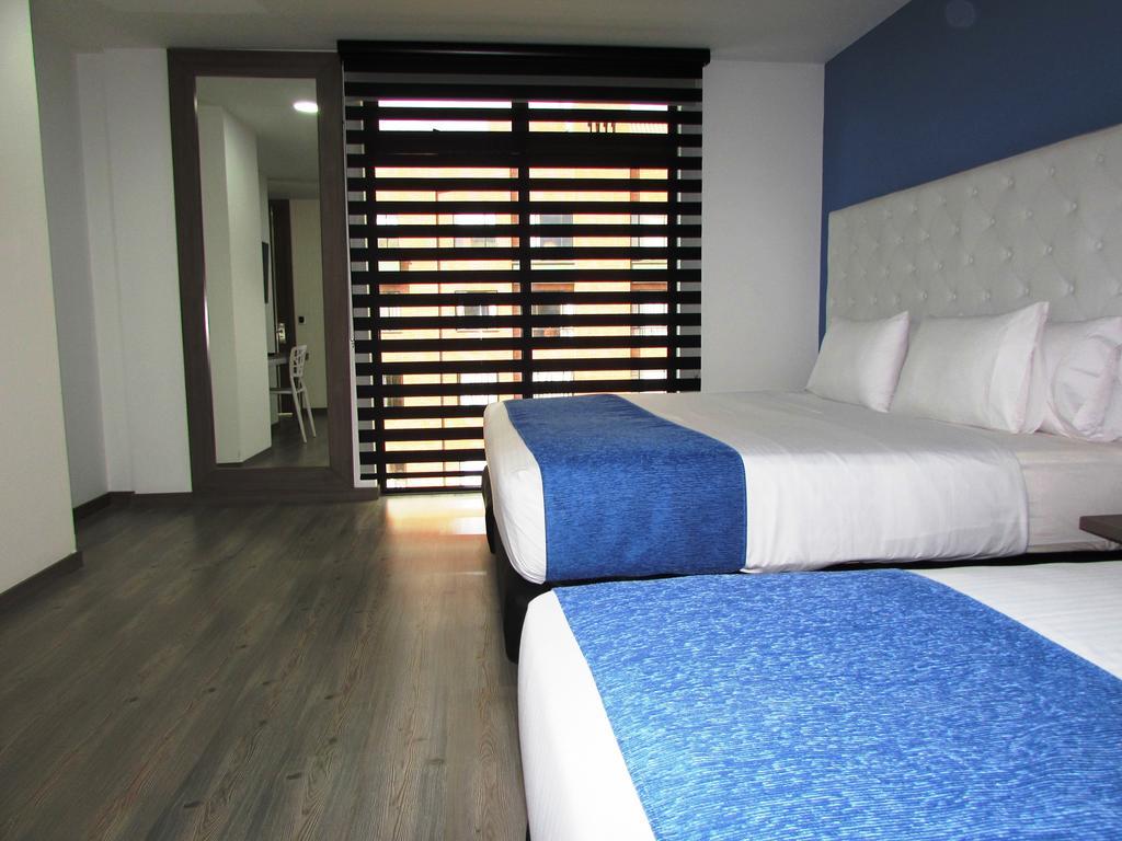 Aw Hotel Plaza Miranda Bogotá Rum bild